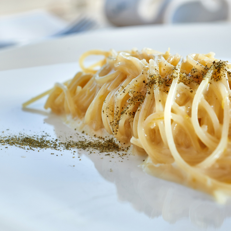 Spaghettini in lemon water, olive oil and Provolone Cheese