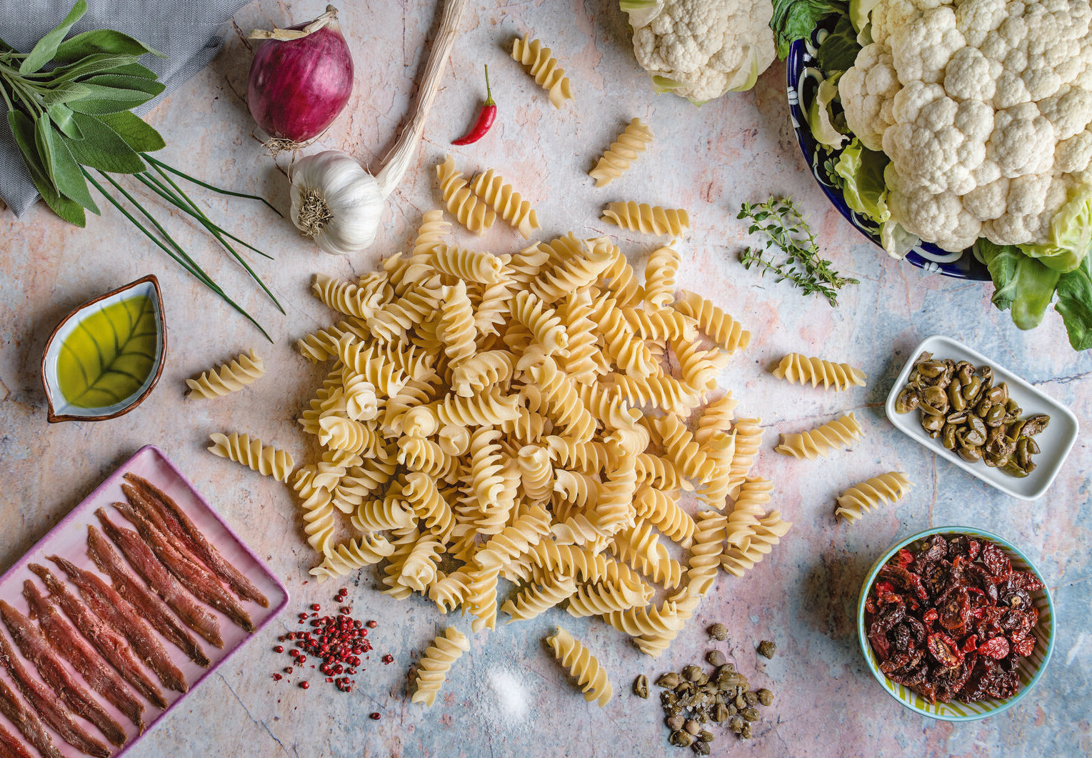 Eliche Giganti with cauliflower, anchovies and sun dried tomatoes